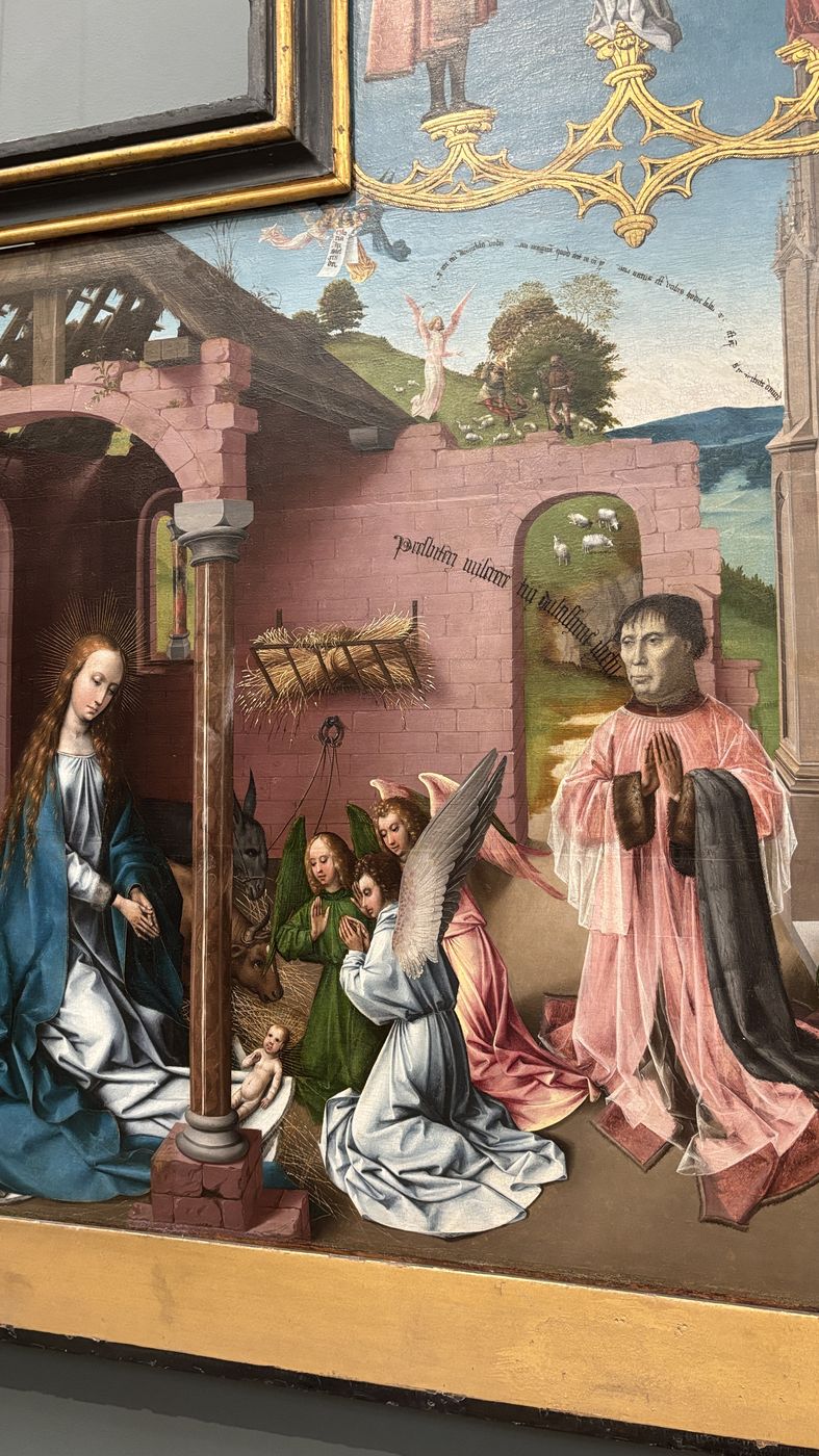 Detail of an Annunciation panel with a kneeling donor
