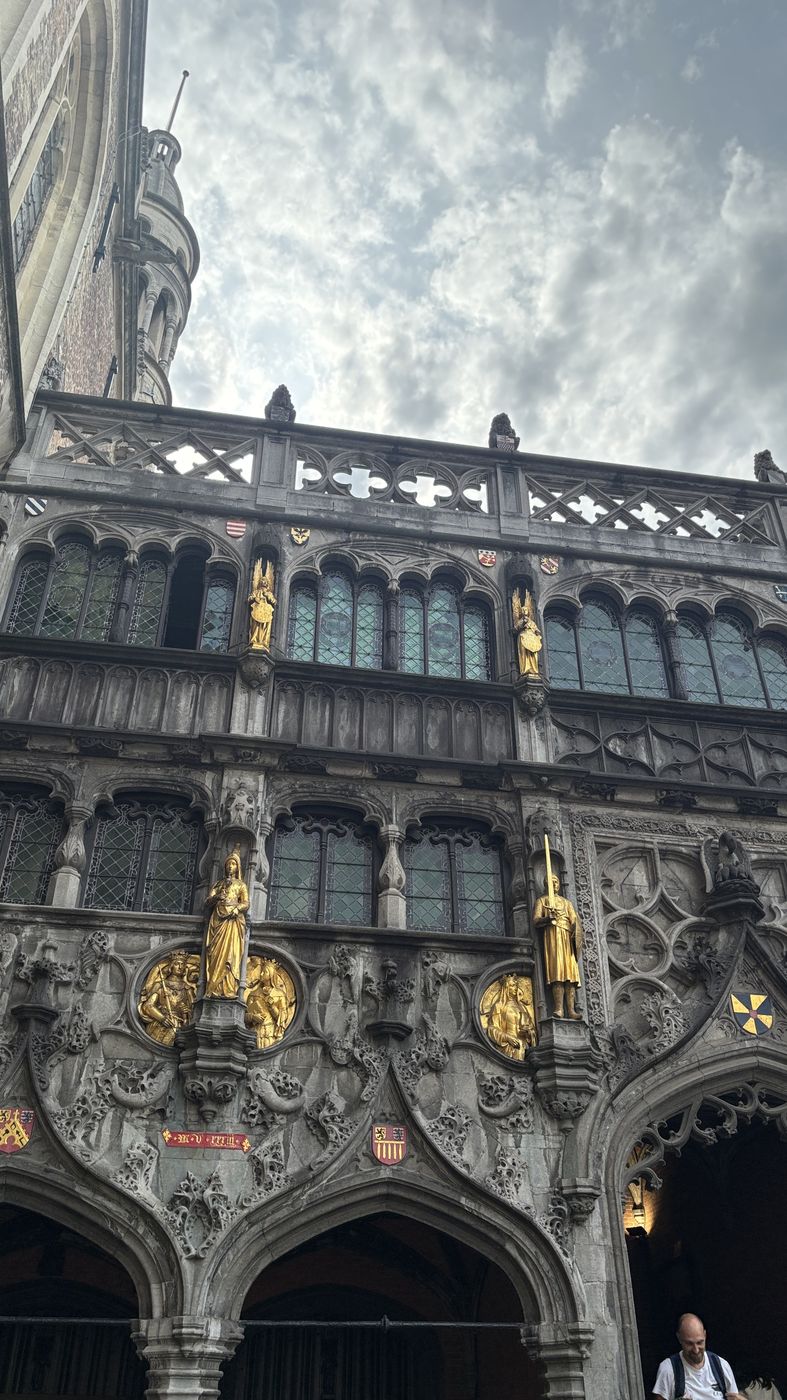 The gilded Gothic facade of the Basilica of the Holy Blood