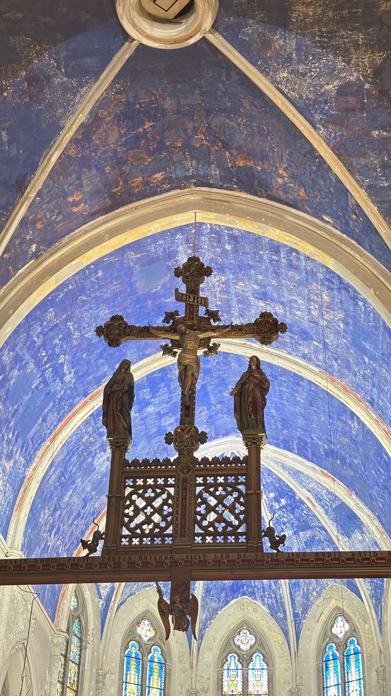 The blue painted vault and crucifix inside the Magdalenakerk