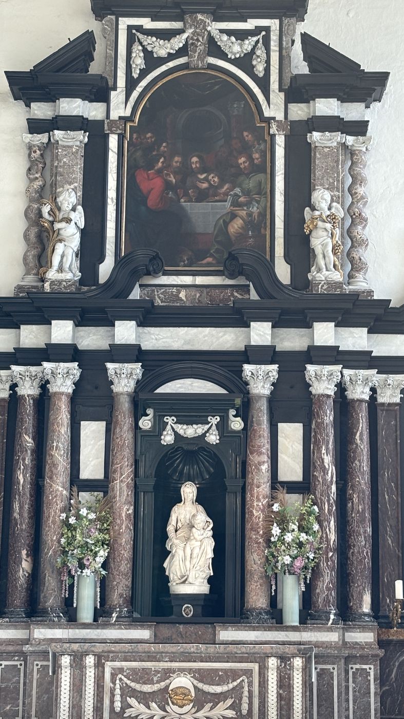Michelangelo’s Madonna and Child in its marble altar