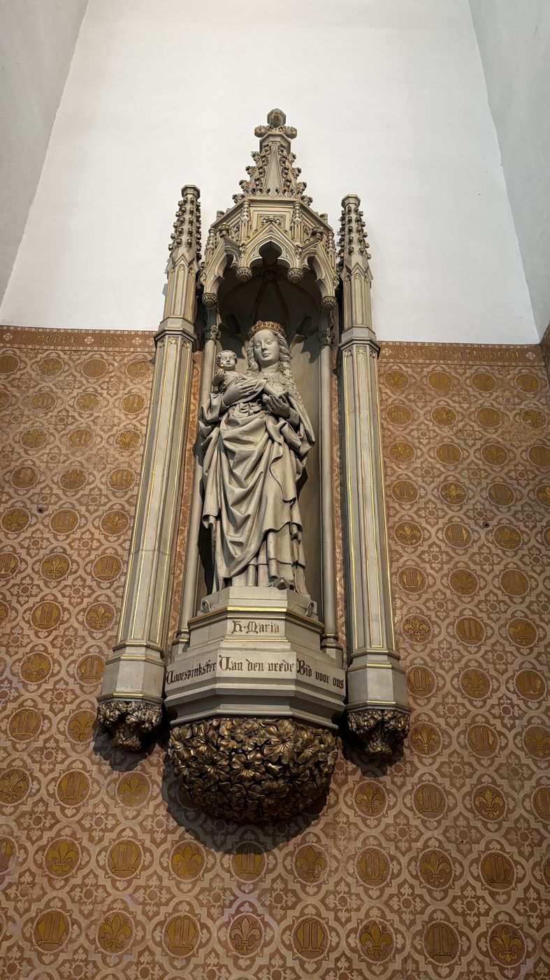 Statue of the Virgin and Child in a Gothic niche