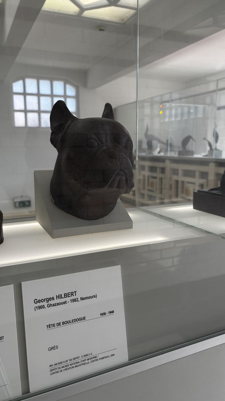 Bronze sculpture of a French bulldog