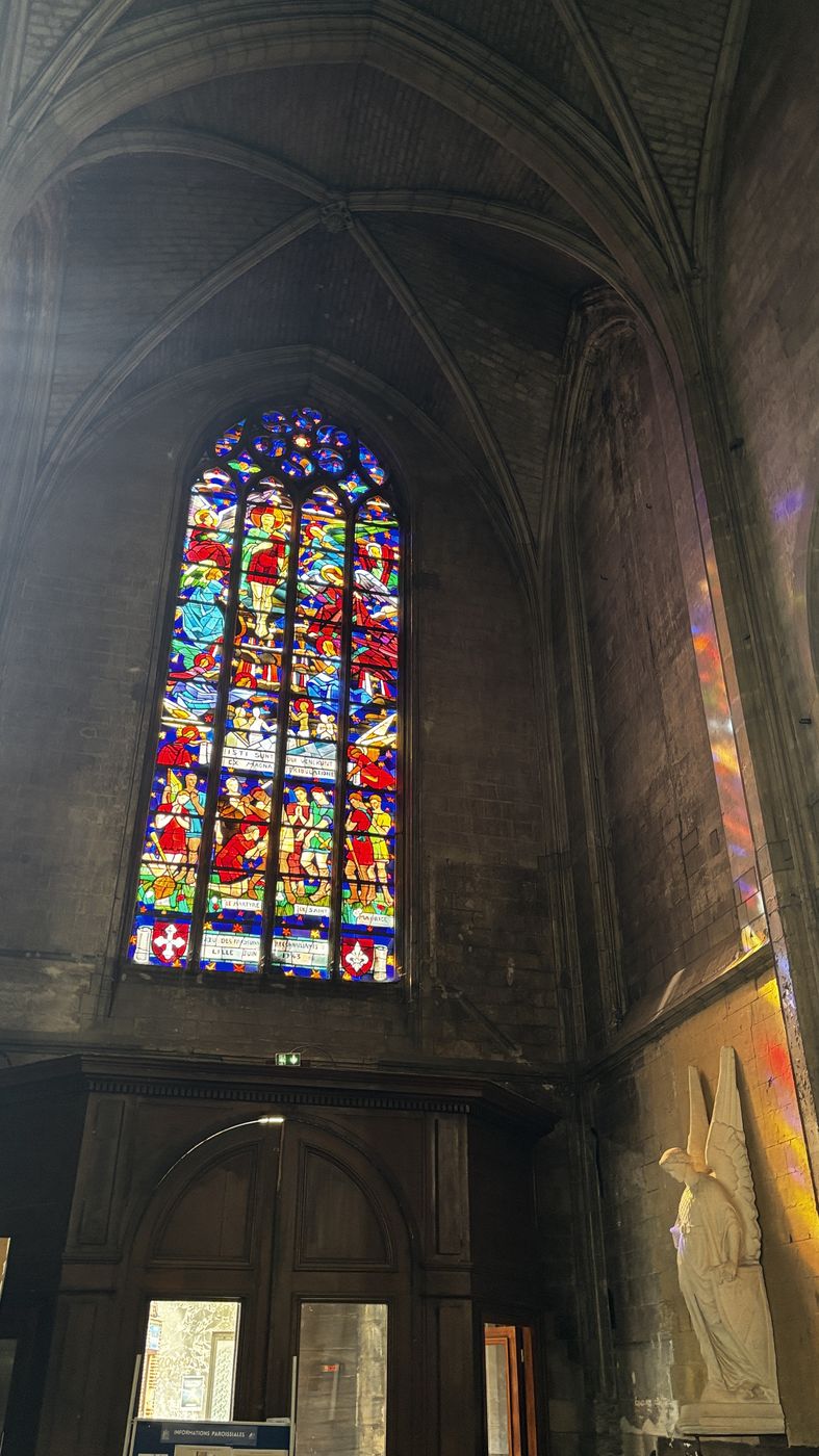 Stained glass window inside Saint-Maurice