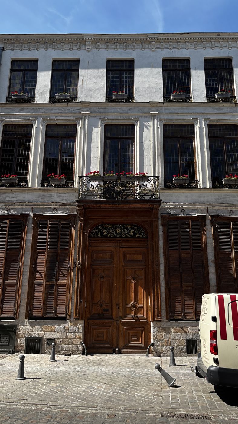 Ornate wooden door on a Vieux-Lille townhouse